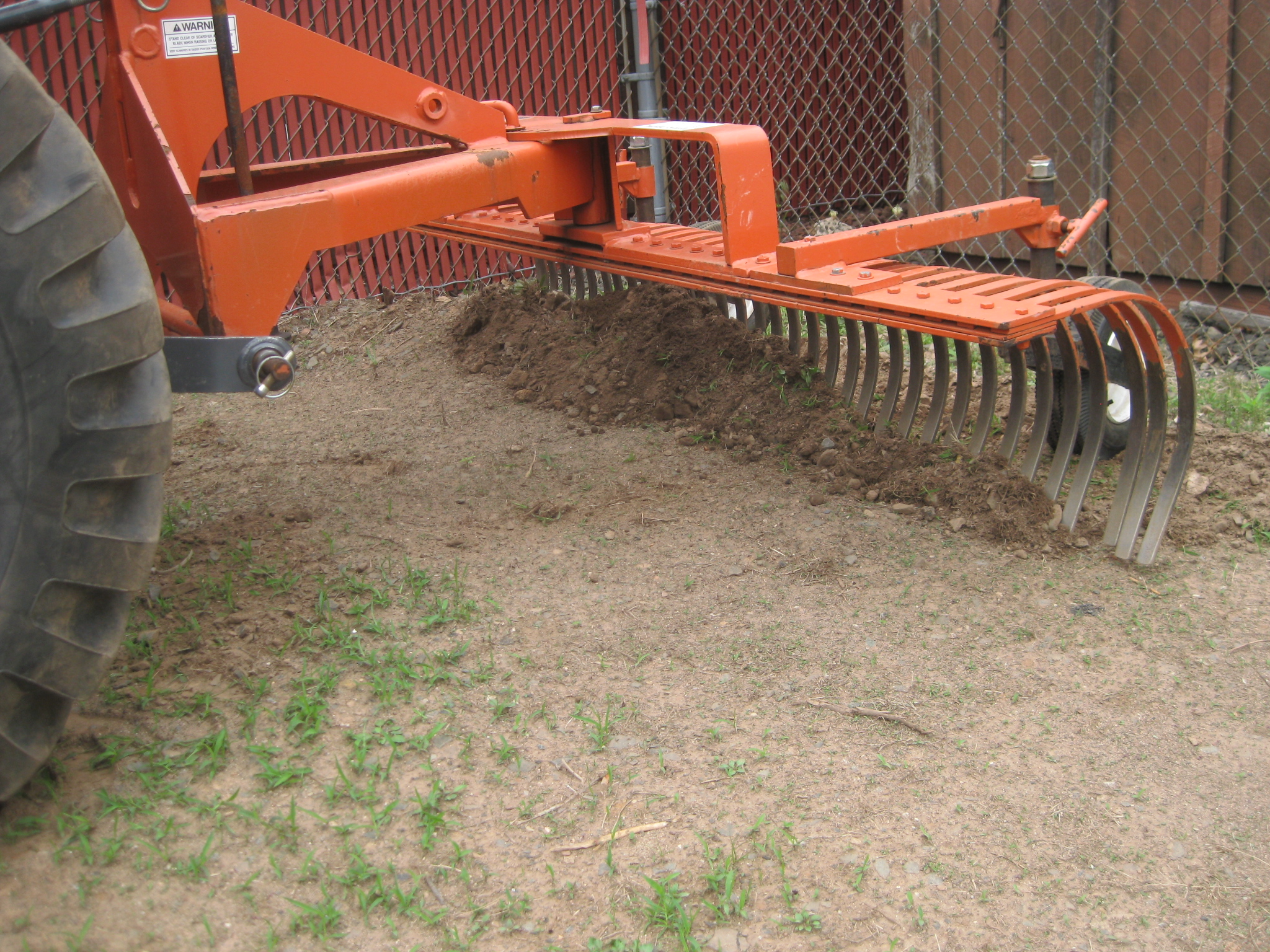 Tractor, Loader with 6 ft York Rake Taylor True Value Rental of